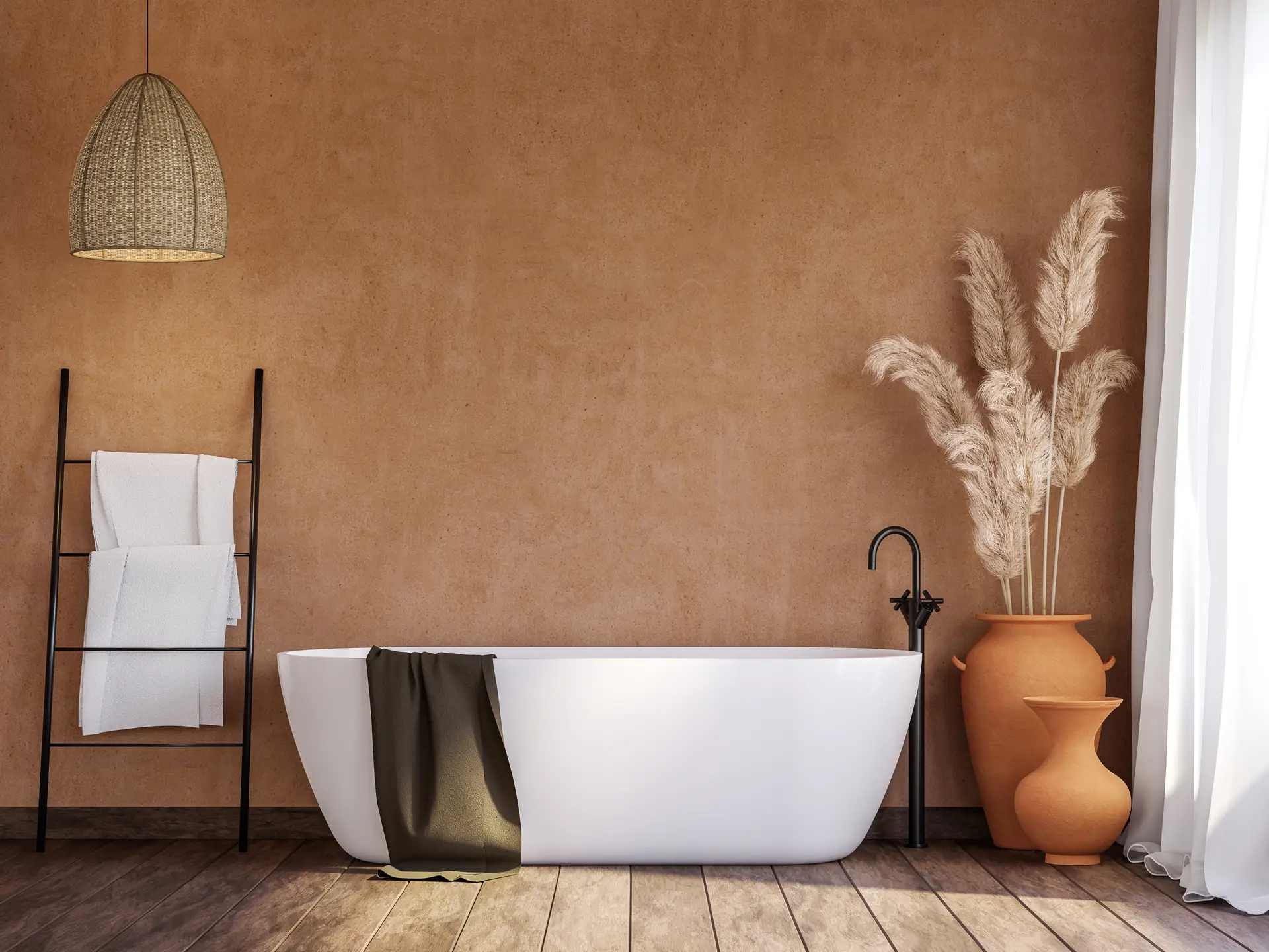 view of a bathroom with blank orange wall and a white soaking bath