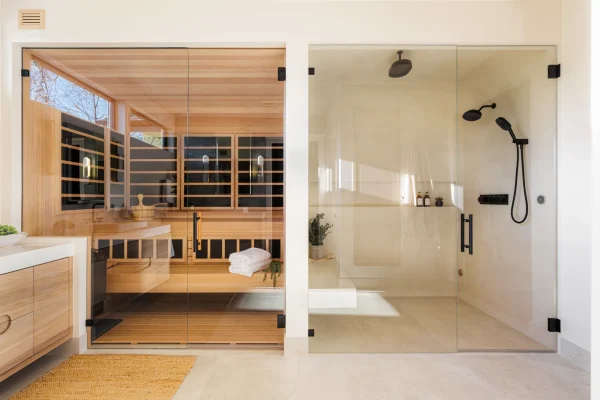 Luxury primary bathroom remodel in Fort Collins Northern Colorado with micro-cement walk in shower and dry sauna.